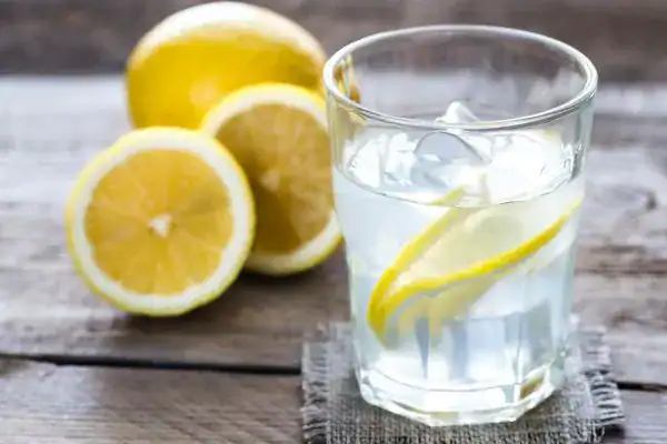 Hydration: The Secret Ingredient for a Toned Stomach and Enhanced Fitness 2 Image of lemon water to aid hydration Wollaton